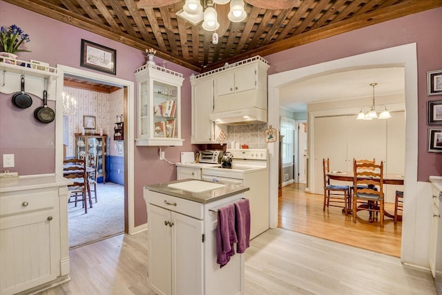 889 Woodhaven St, North, SC 29112 - kitchen with arched walkways, light wood finished floors, electric stove, under cabinet range hood, and a ceiling fan