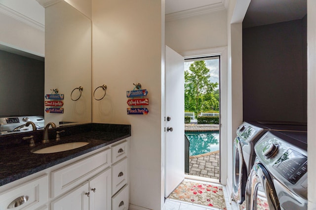 3507 Lost Tree Ln, Martinez, GA 30907 - bathroom featuring washer and dryer, crown molding, vanity, and tile patterned flooring