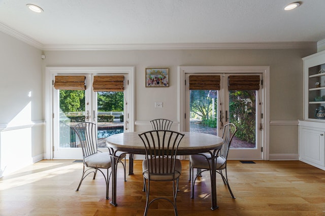 3507 Lost Tree Ln, Martinez, GA 30907 - dining area with french doors, light wood-type flooring, crown molding, baseboards, and recessed lighting