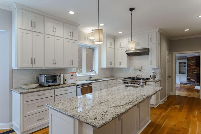 3507 Lost Tree Ln, Martinez, GA 30907 - kitchen with a sink, stainless steel dishwasher, white cabinets, wood finished floors, and crown molding