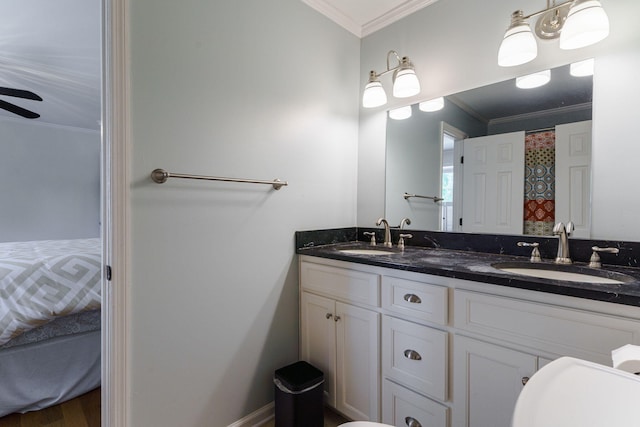 3507 Lost Tree Ln, Martinez, GA 30907 - ensuite bathroom featuring double vanity, ornamental molding, ceiling fan, and toilet