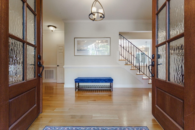 3507 Lost Tree Ln, Martinez, GA 30907 - foyer with wood finished floors, ornamental molding, stairs, and a chandelier