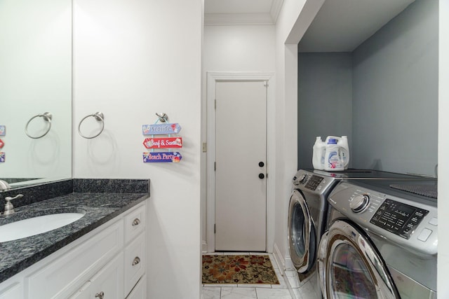 3507 Lost Tree Ln, Martinez, GA 30907 - washroom featuring washer and clothes dryer, ornamental molding, light marble finish flooring, and baseboards