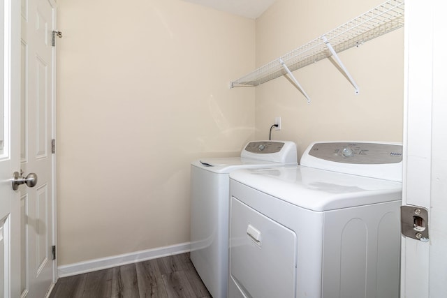 2697 York Dr, Augusta, GA 30909 - laundry area featuring independent washer and dryer, dark wood-style flooring, and baseboards