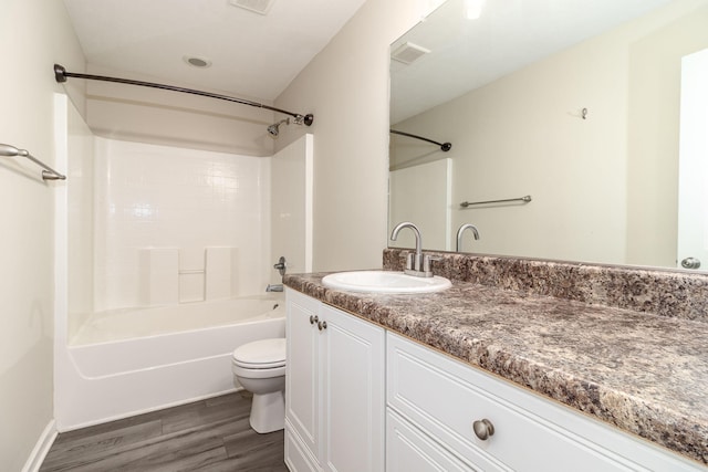2697 York Dr, Augusta, GA 30909 - full bathroom with toilet, wood finished floors, vanity, and shower / bathtub combination