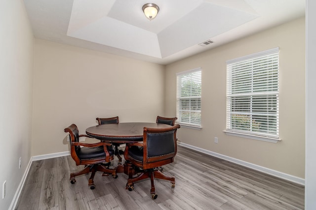 2697 York Dr, Augusta, GA 30909 - dining area with wood finished floors, a raised ceiling, and baseboards