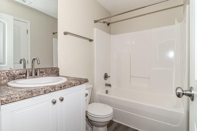 2697 York Dr, Augusta, GA 30909 - bathroom featuring toilet, vanity, bathing tub / shower combination, and wood finished floors