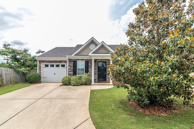 2697 York Dr, Augusta, GA 30909 - view of front of house featuring an attached garage, driveway, and roof with shingles