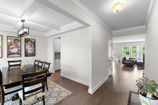 dining room featuring dark wood-style floors, baseboards, beam ceiling, ornamental molding, and coffered ceiling
