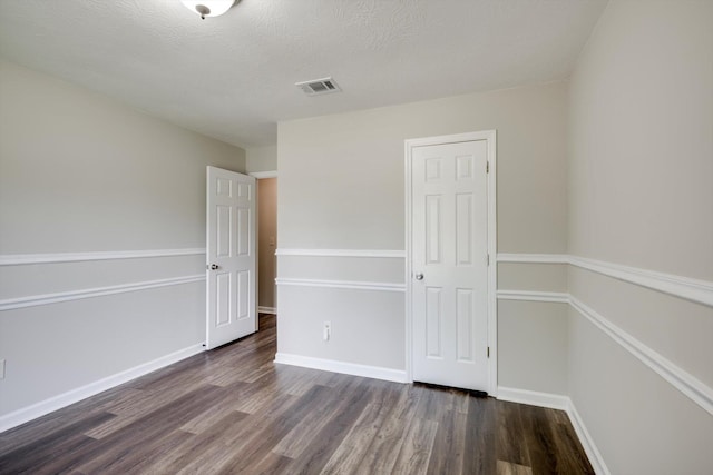 619 Kimberley Pl, Evans, GA 30809 - empty room featuring dark wood-style floors and baseboards