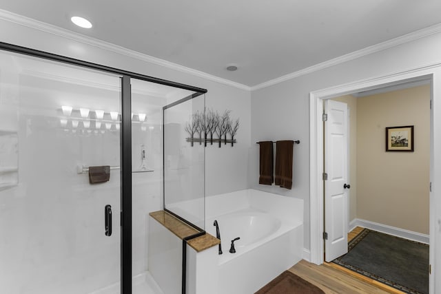 165 Indian Valley Ln, Swansea, SC 29160 - full bathroom with a bath, a stall shower, wood finished floors, crown molding, and baseboards