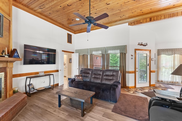 165 Indian Valley Ln, Swansea, SC 29160 - living area featuring wooden ceiling, ceiling fan, crown molding, wood finished floors, and a high ceiling