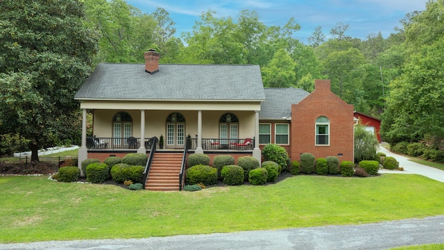 165 Indian Valley Ln, Swansea, SC 29160 - view of front of home with stairway, french doors, and a front lawn