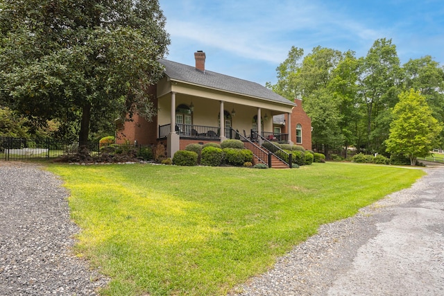 165 Indian Valley Ln, Swansea, SC 29160 - bungalow-style house featuring covered porch, a chimney, stairs, and stucco siding