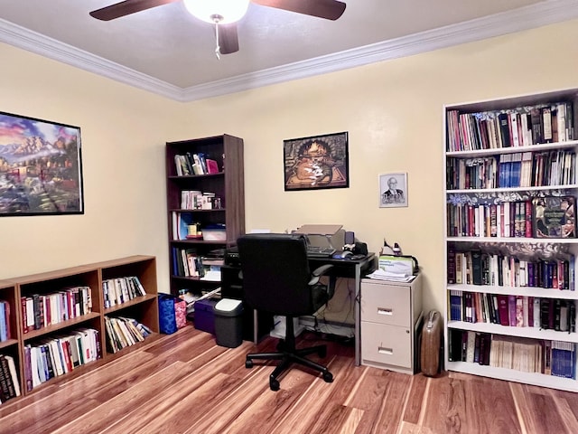 home office featuring ceiling fan, light wood-type flooring, and ornamental molding