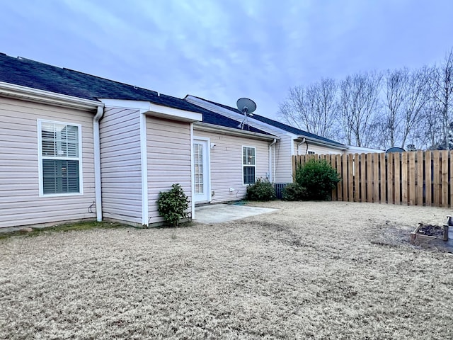 back of property with a patio area