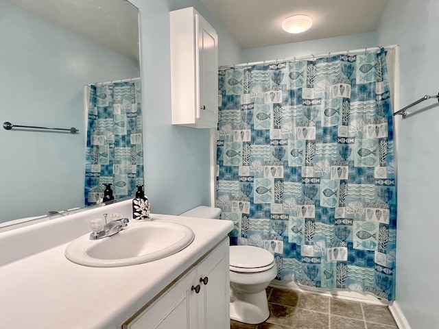 bathroom with walk in shower, vanity, and toilet