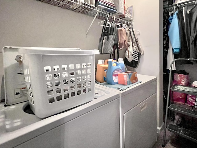 laundry room with independent washer and dryer