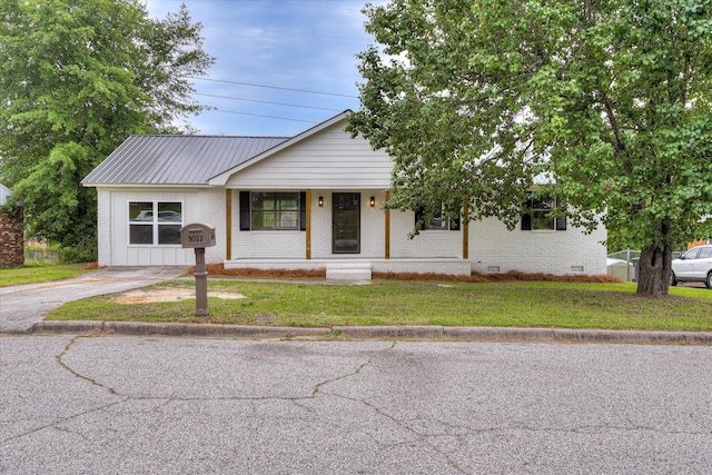 3022 Shady Ln, Hephzibah, GA 30815 - view of front facade with crawl space, a front lawn, brick siding, and metal roof