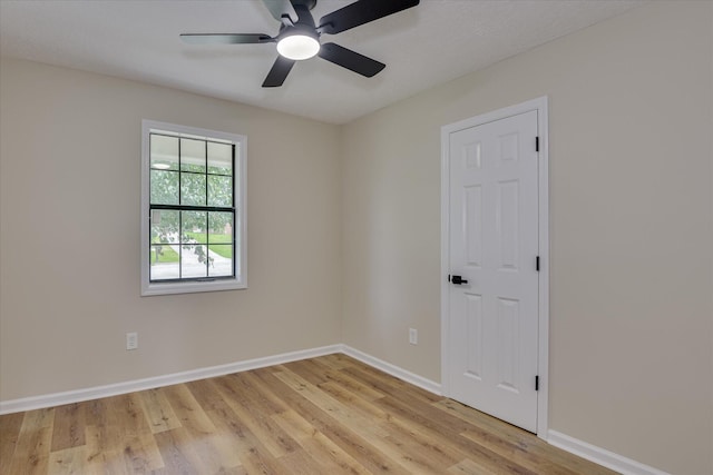 3022 Shady Ln, Hephzibah, GA 30815 - empty room featuring light wood-type flooring, a ceiling fan, and baseboards
