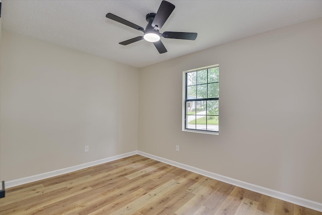 3022 Shady Ln, Hephzibah, GA 30815 - spare room with light wood-style floors, baseboards, and a ceiling fan