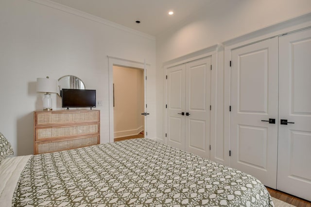 bedroom with ornamental molding