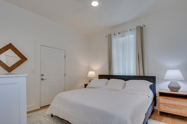 bedroom featuring a closet and light hardwood / wood-style flooring