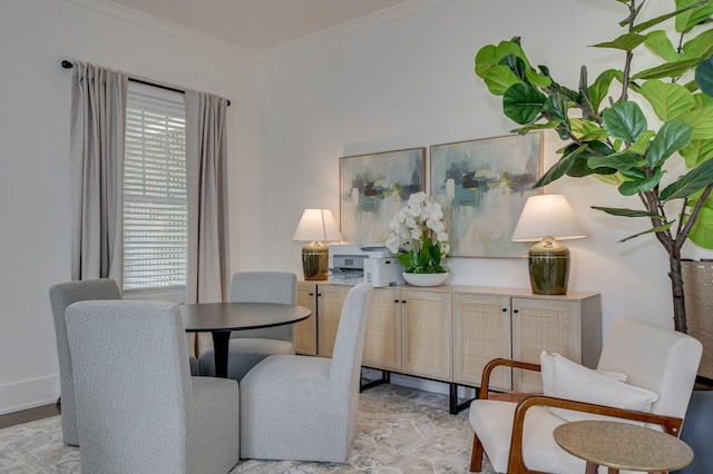 living area featuring crown molding and a healthy amount of sunlight