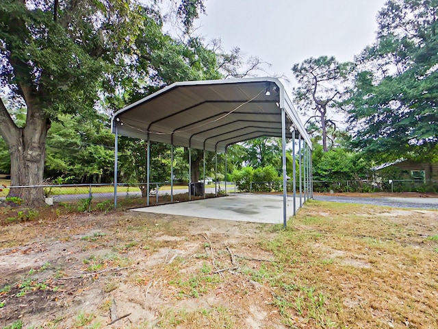 view of parking / parking lot with a carport