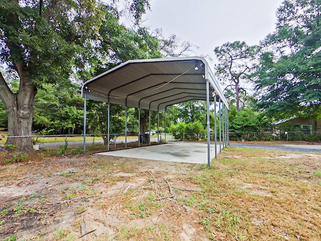 2438 Ridge Rd, Augusta, GA 30906 - view of parking featuring fence and a carport
