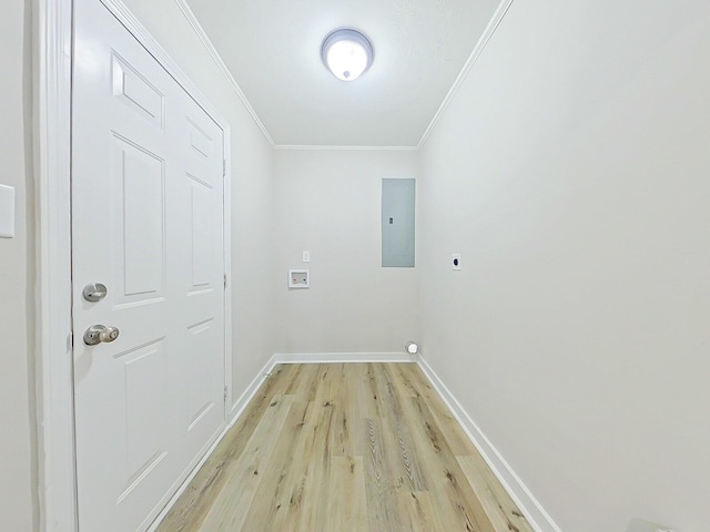 clothes washing area featuring hookup for an electric dryer, hookup for a washing machine, light hardwood / wood-style floors, crown molding, and electric panel