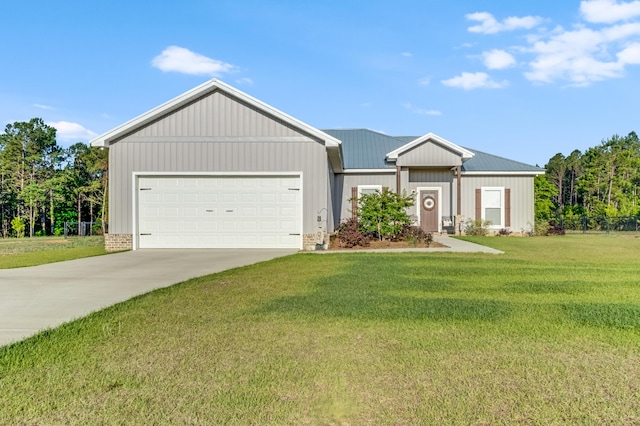 view of front of home with concrete driveway, a garage, and a front yard