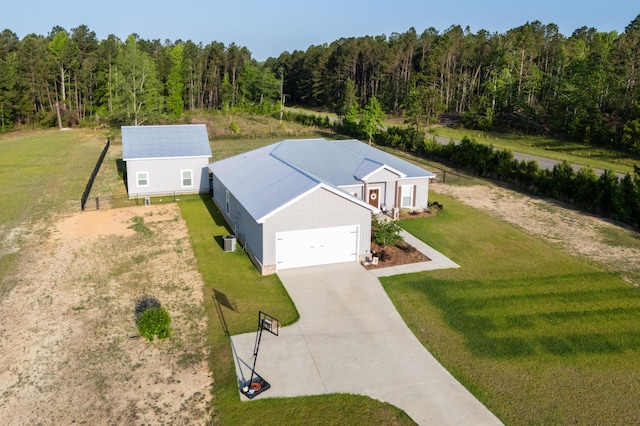 bird's eye view featuring a forest view