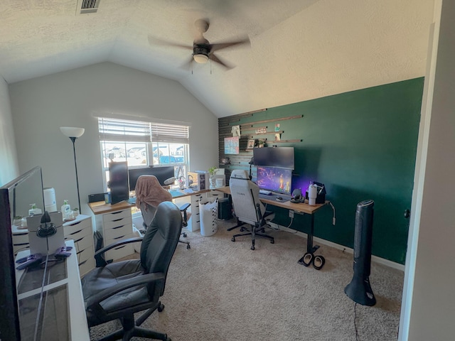 home office with carpet flooring, a textured ceiling, ceiling fan, and lofted ceiling