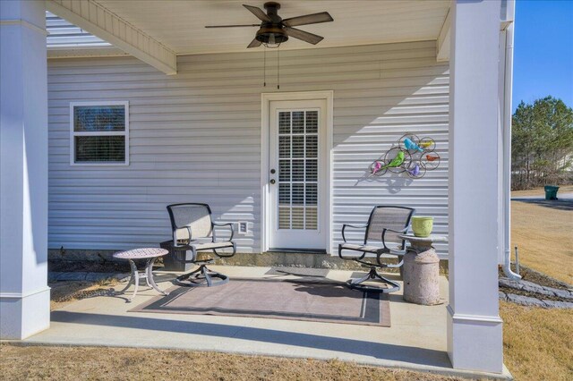 view of patio / terrace featuring ceiling fan