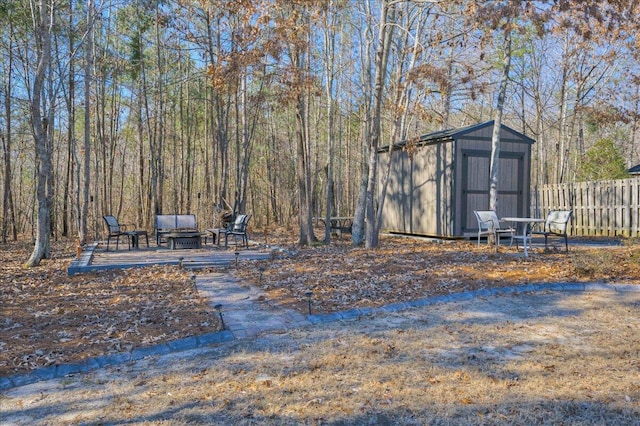 view of yard with a storage unit