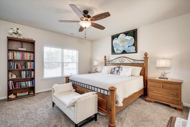 bedroom with ceiling fan and carpet floors