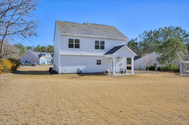 rear view of property featuring a patio