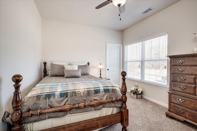 bedroom featuring ceiling fan and light colored carpet