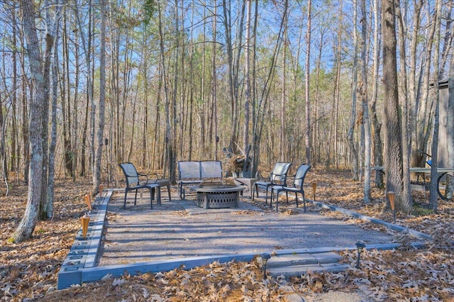 view of patio / terrace with a fire pit