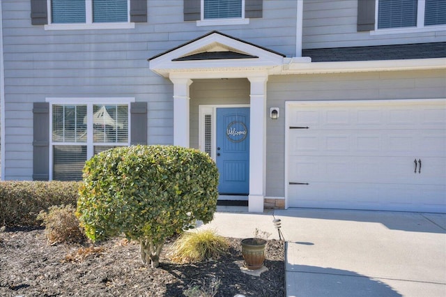 property entrance with a garage