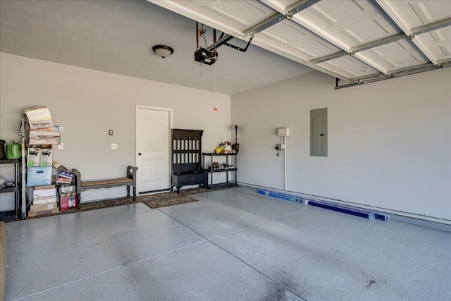 garage featuring electric panel and a garage door opener