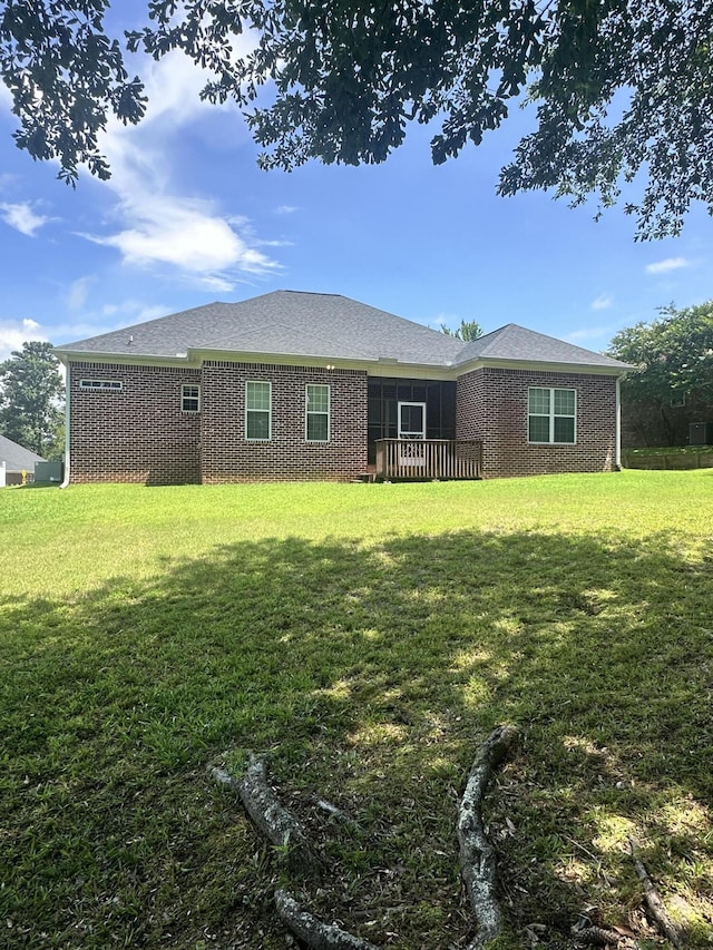 561 Farmington Cir, Evans, GA 30809 - rear view of house featuring a yard and brick siding
