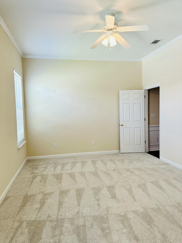 561 Farmington Cir, Evans, GA 30809 - unfurnished room with crown molding, carpet floors, and a ceiling fan