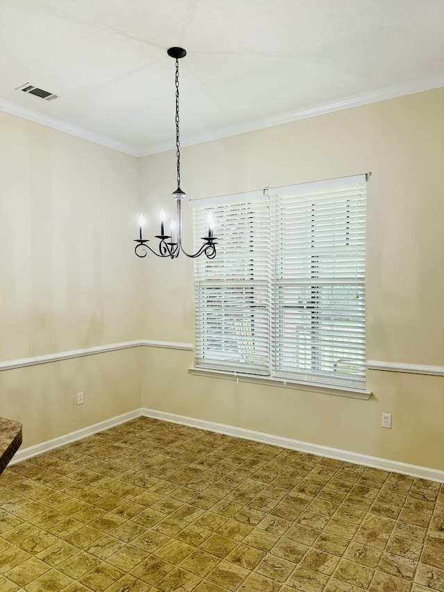 561 Farmington Cir, Evans, GA 30809 - spare room with healthy amount of natural light, ornamental molding, and a chandelier