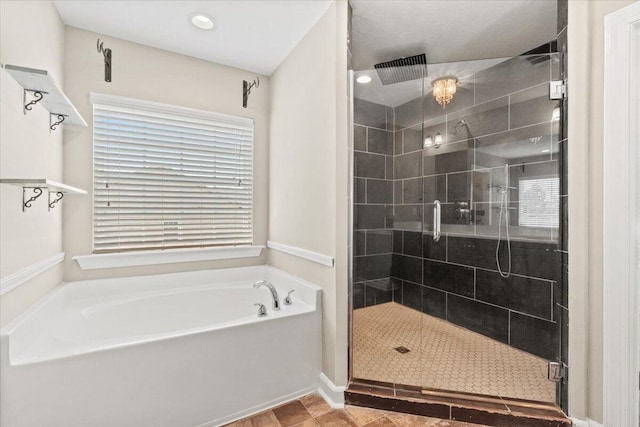 1717 Ethan Way, Hephzibah, GA 30815 - full bath featuring a garden tub, a shower stall, and recessed lighting