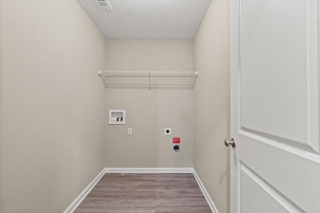 1717 Ethan Way, Hephzibah, GA 30815 - washroom with electric dryer hookup, hookup for a washing machine, and wood finished floors