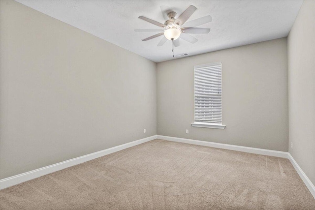 1717 Ethan Way, Hephzibah, GA 30815 - empty room with a ceiling fan and carpet flooring
