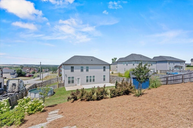 1717 Ethan Way, Hephzibah, GA 30815 - rear view of property with a residential view, a patio area, and a fenced backyard