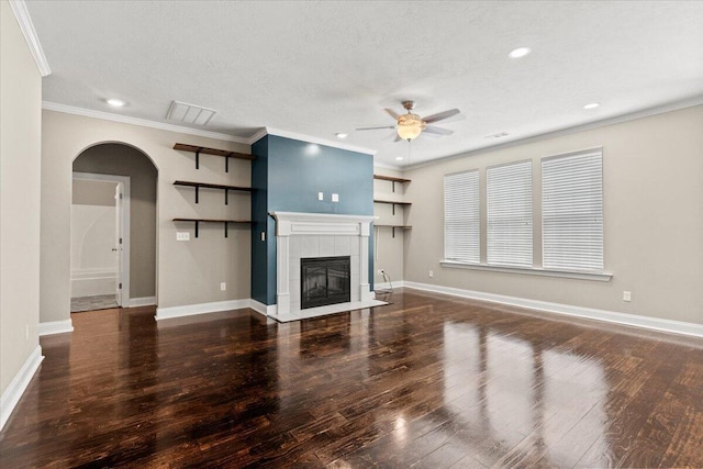 1717 Ethan Way, Hephzibah, GA 30815 - unfurnished living room featuring arched walkways, ceiling fan, wood finished floors, recessed lighting, and crown molding